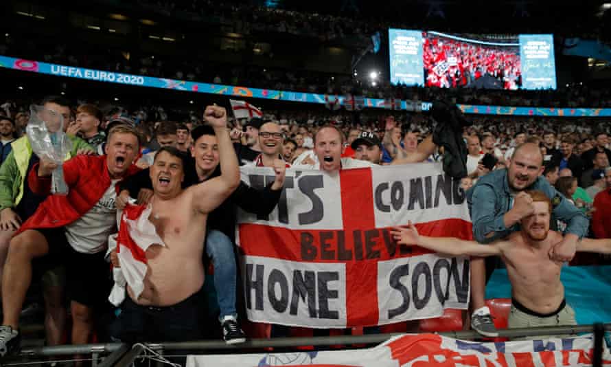 England fans celebrate wildly at the final whistle.