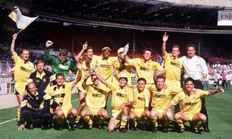 Cambridge United players celebrate their victory in the Fourth Divisions play-offs in May 1990.