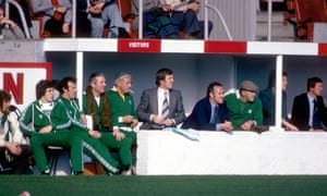 Celtic manager Billy McNeill (sixth left) and Aberdeen manager Alex Ferguson (right) man the dugouts, along with their staff, at Pittodrie in October 1978.