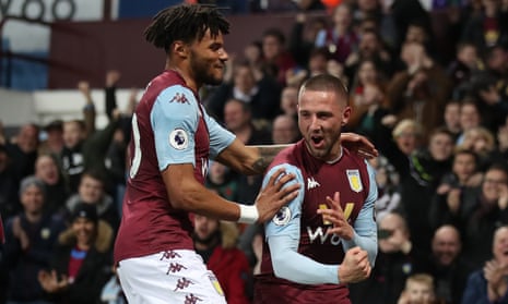 Aston Villa’s Conor Hourihane, right, celebrates scoring his side’s first goal.