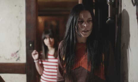 A mother and child looking scared