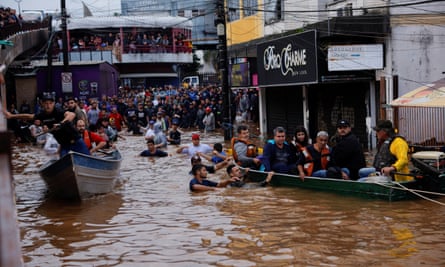 People being rescued from severe floods in Canoas, Rio Grande do Sul state