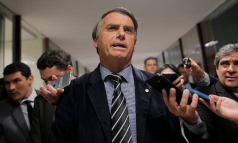 Jair Bolsonaro speaks with journalists earlier in the week.