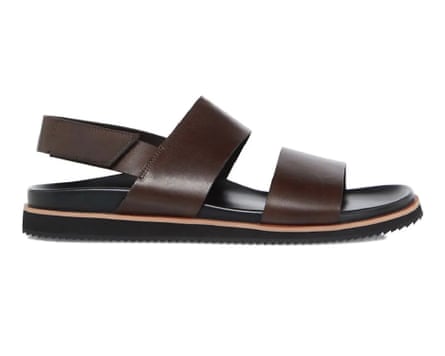 A side view of a Dune Idda Utilitarian Strap Sandal in brown leather.