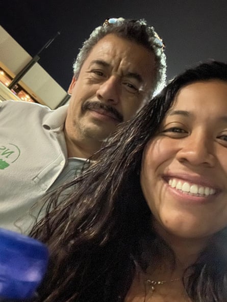 An older man with a smiling young woman.