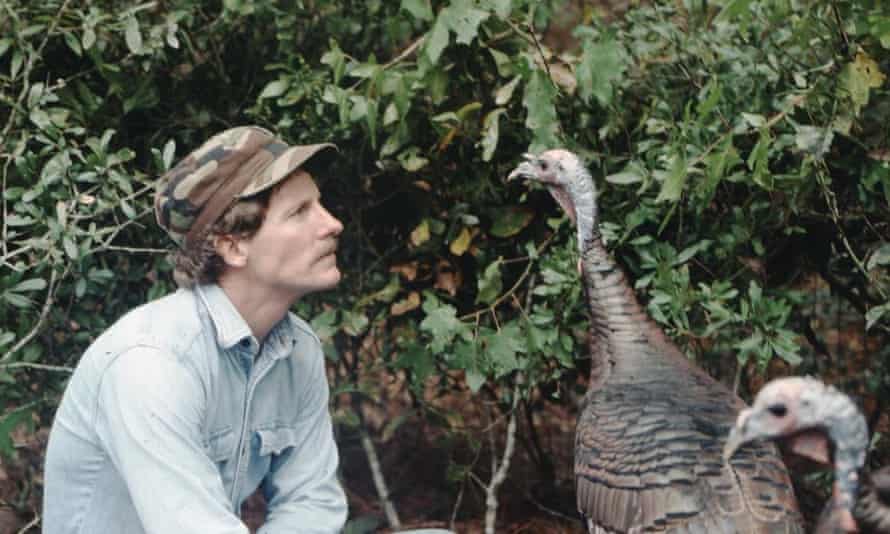 Joe Hutto with two turkeys