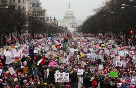 The Mario Tama photo of the Women’s March in January 2017. The Archives’ version featured a minimum of four anti-Trump signs that had been digitally altered placards.