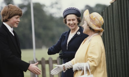Shaking hands with the late Queen and Queen Mother during the Eton Boys’ tea party at Windsor in June 1978.