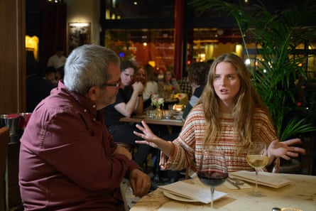 Steve and Eva chatting across a restaurant table