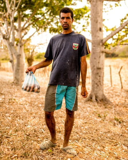 Ricardo, 39, lost his job at a coffee plantation. Though unsteady on his feet, he now sells eggs by the side of the road to support himself and his family.