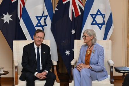 Isaac Herzog and Sam Mostyn during a ceremonial welcome at Government House in Canberra