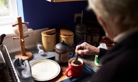 Older person making hot drink