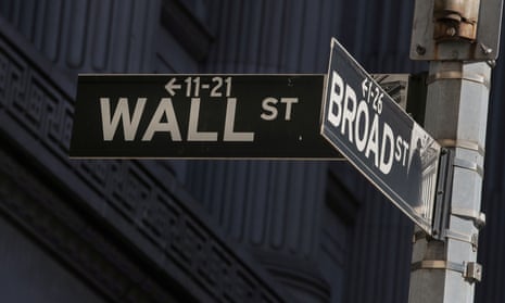Street signs for Broad Street and Wall Street outside of the New York Stock Exchange