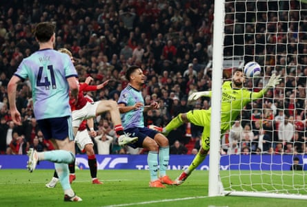 Arsenal’s David Raya makes a fine save against Manchester United at Old Trafford