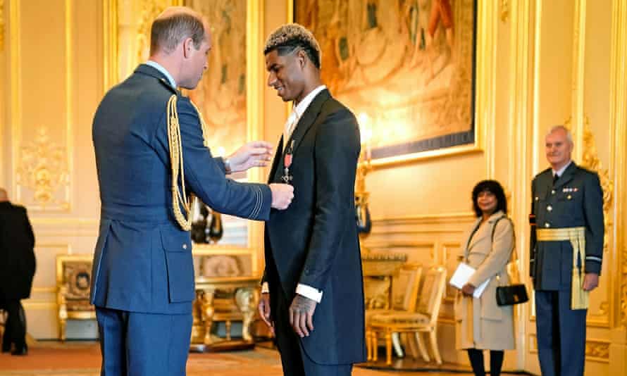 Guardian readers nominate their person of the year | World news 6 Footballer Marcus Rashford being made an MBE (Member of the Order of the British Empire) by the Duke of Cambridge during an investiture ceremony at Windsor Castle on Tuesday 21 December 21, 2021.