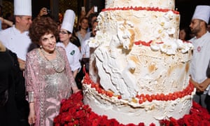 Lollobrigida admires her 90th birthday cake at the official Gina Lollobrigida Birthday Celebrations in Rome on 4 July 2017
