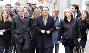 Artur Mas (second right) arrives with colleagues at the supreme court in Madrid.