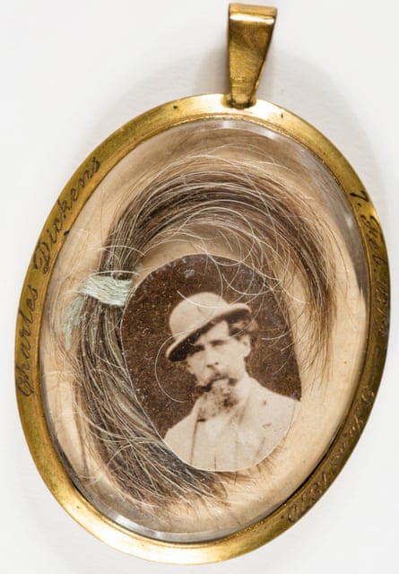 Photo of Dickens inside gold locket with hair