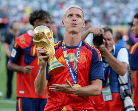 Spain’s Dani Olmo with the World Cup after their victory over Argentina in New York