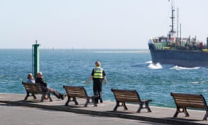 Police patrol the seafront in Sandbanks, Poole