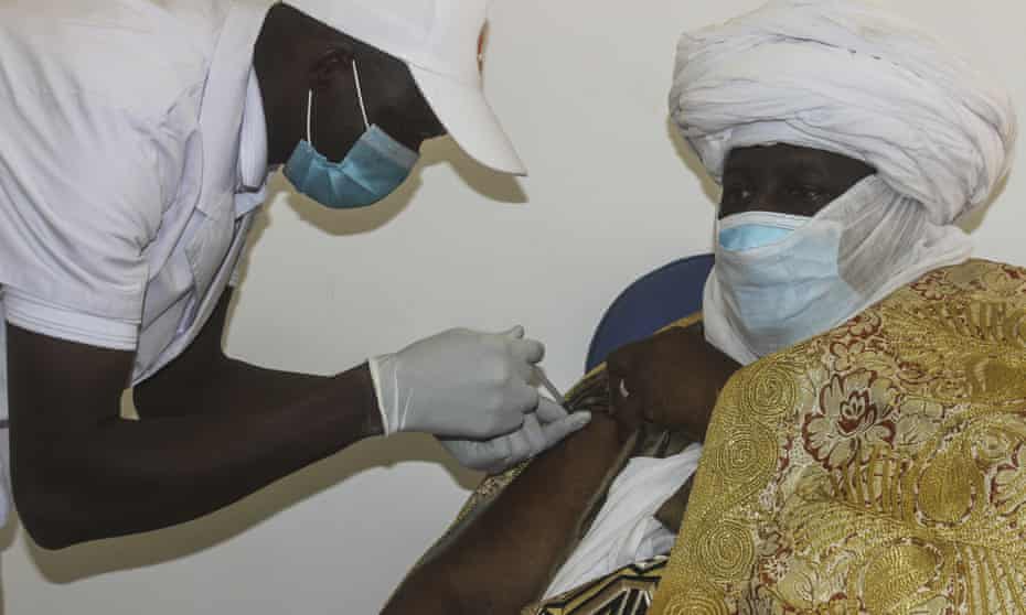 A woman is among the first in Niger to receive a Covid-19 vaccine, Niamey, 29 March 2021.