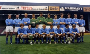 Bell and his Manchester City team mates show off their haul at the end of the 1970/71 season - the European Cup Winners Cup (left) and the League Cup.