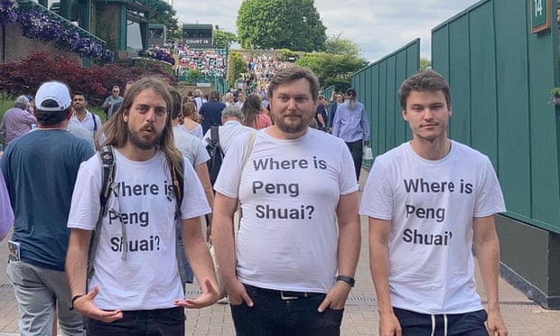 Protesters Jason Leith, Will Hoyles and Caleb Compton wearing T-shirts with the words 'Where is Peng Shuai?'