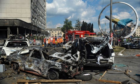 Burnt-out cars and debris in central Vinnytsia, after the Russian attack.