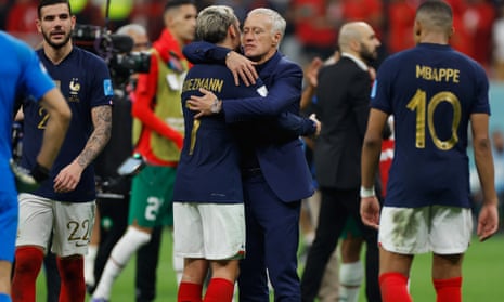 Head coach Didier Deschamps embraces Antoine Griezmann at full-time as France progress to Sunday’s final against Argentina.