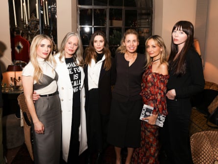 people standing smiling at camera