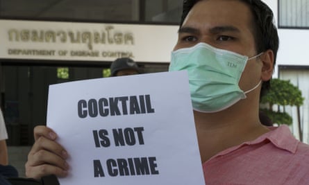 A member of the Craft Beer Association holds a placard reading ‘Cocktail is not a crime’