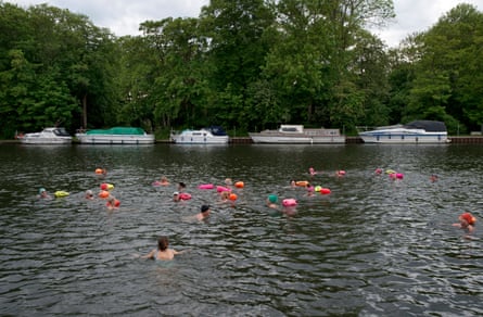 A group of bathers swimming in the Thames