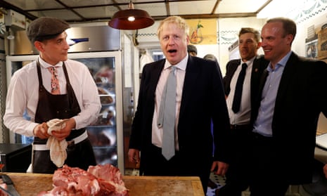 Boris Johnson with Dominic Raab in a butcher’s shop in Oxshott, Surrey, June 2019