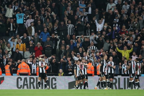 Newcastle United’s Bruno Guimaraes celebrates scoring their second goal with teammates.