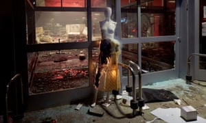People loot and burn the Target store near the Minneapolis police third precinct.