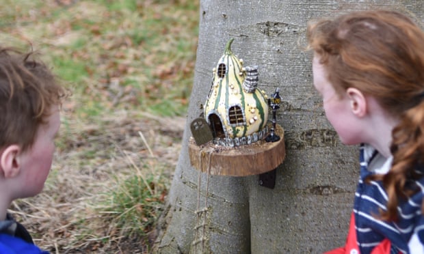 The writer’s children look at a fairy house at Archerfield Walled Gardens, Scotland.
