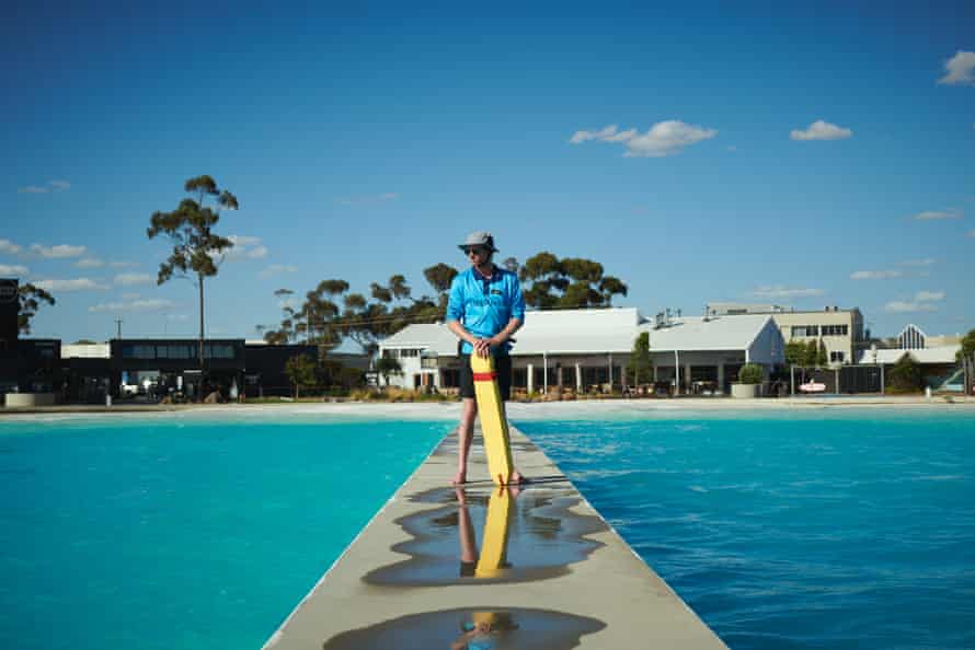 Life guard Taylor Cookshank on patrol at Urbnsurf, Melbourne.