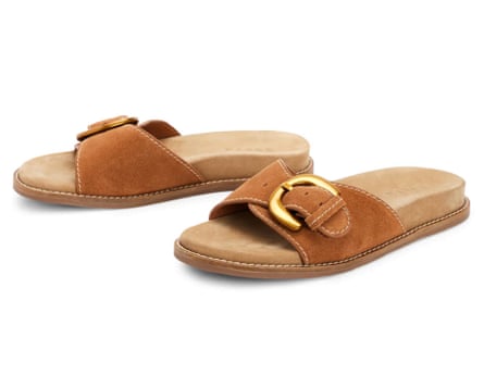 A pair if Boden Hardware Mule Sandal with wide buckle toe strap.