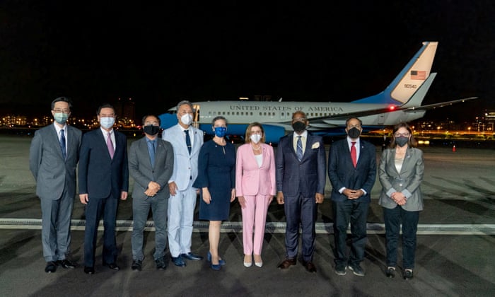 A group photo Pelosi and other members of the delegation arrive in Taipei Songshan on Tuesday.