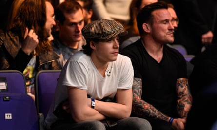 Brooklyn Beckham wearing an old-fashioned style cap.