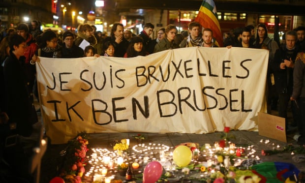 People hold up a banner as a mark of solidarity at the Place de la Bourse following today’s attacks on March 22, 2016 in Brussels, Belgium. Photograph: Carl Court/Getty Images https://i.guim.co.uk/img/media/a846a8c7b4d21679a00ee120a4d903d27c3f7068/0_0_5184_3110/master/5184.jpg?w=620&q=55&auto=format&usm=12&fit=max&s=651ad9b8ced8d7cad602692b694ef88d