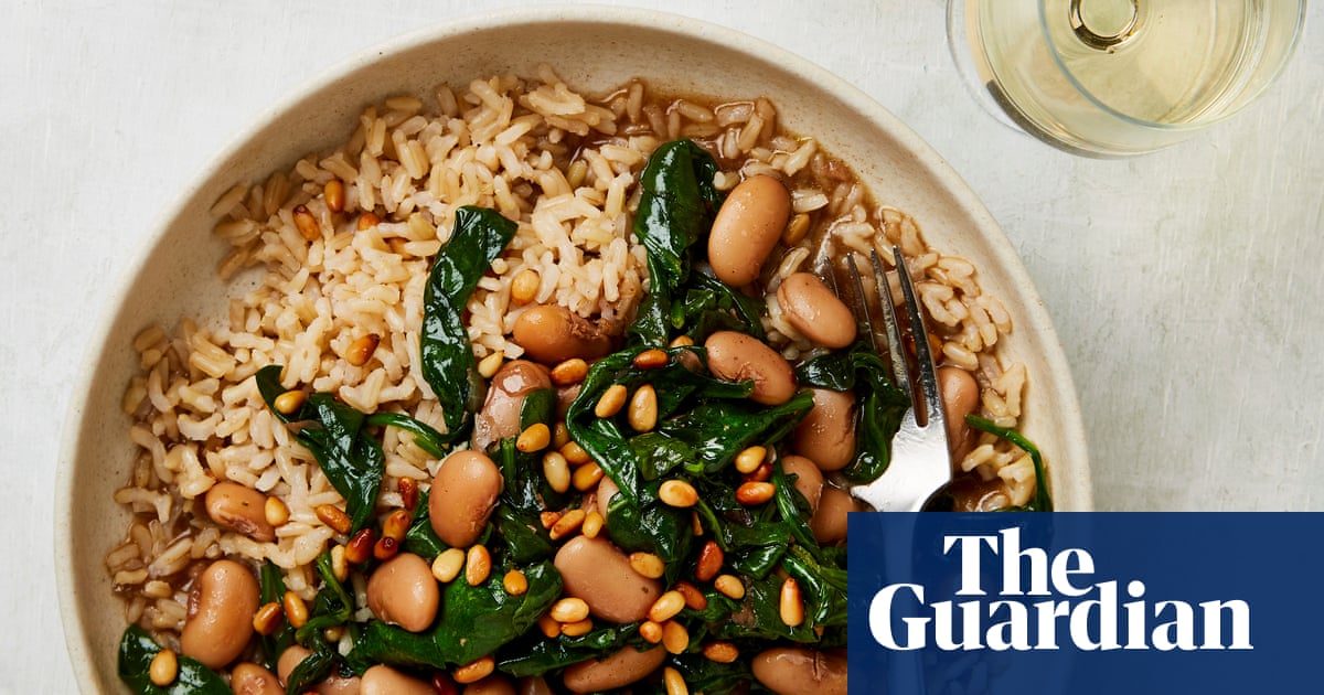 Meera Sodha’s vegan recipe for spinach and butter bean stew with toasted pine nuts