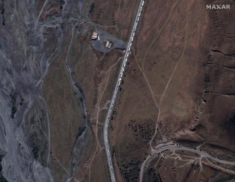 Satellite image released by Maxar Technologies, taken on 25 September and showing trucks and cars waiting in a traffic jam near the Russian border with Georgia.