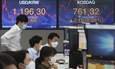 Currency traders at the foreign exchange dealing room of the KEB Hana Bank headquarters in Seoul, South Korea, today