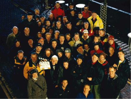 The Queer as Folk cast and crew, Canal Street. Manchester, 1998, in a group shot photographed from above.