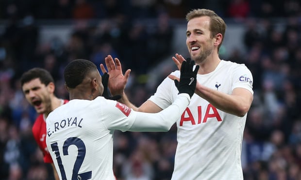 Harry Kane celebrates with Emerson Royal after scoring Tottenham's third goal against Morecambe
