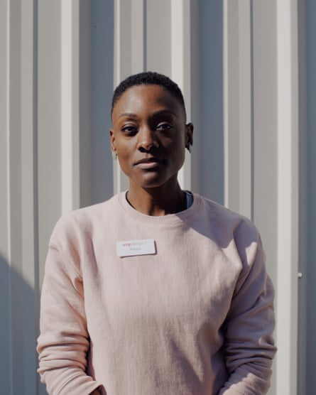 woman wearing pale pink sweater