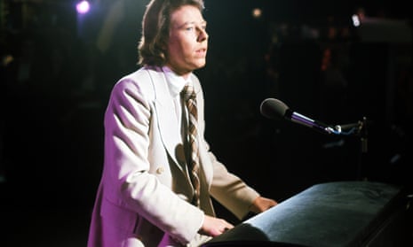 Peter Skellern standing playing a piano, 1975