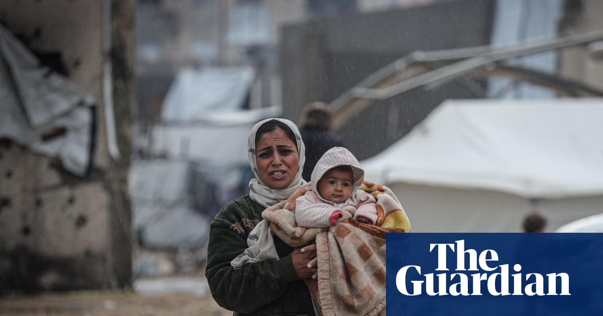 Families washed out of tents as floodwaters course through Gaza
