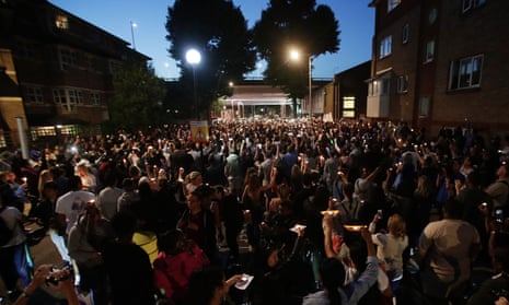 Tower block fire in LondonPeople hold candles aloft during a vigil outside Latymer Church, close to Grenfell Tower in west London after a fire engulfed the 24-storey building on Wednesday morning. PRESS ASSOCIATION Photo. Picture date: Friday June 16, 2017. See PA story FIRE Grenfell. Photo credit should read: Yui Mok/PA Wire